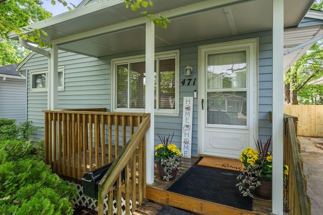 471 Chase Rd, Columbus, OH 43214 - property entrance featuring covered porch and fence