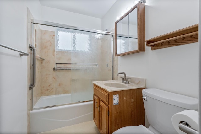 471 Chase Rd, Columbus, OH 43214 - bathroom featuring toilet, bath / shower combo with glass door, and vanity