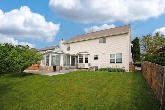 917 Linkfield Dr, Columbus, OH 43085 - rear view of house with entry steps, a sunroom, a patio area, and cooling unit