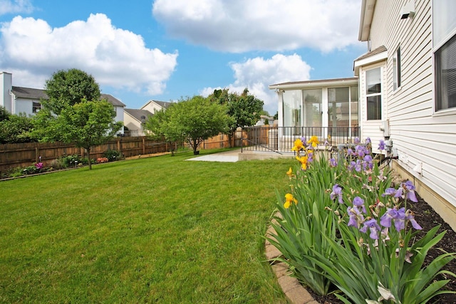 917 Linkfield Dr, Columbus, OH 43085 - view of yard featuring a patio area and a sunroom