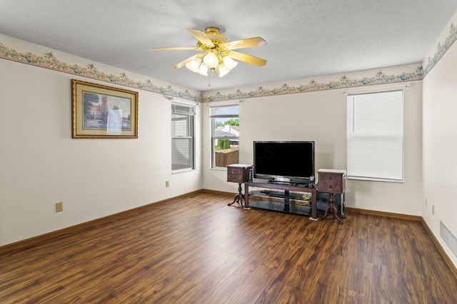 917 Linkfield Dr, Columbus, OH 43085 - living area with wood finished floors, baseboards, ceiling fan, and a textured ceiling