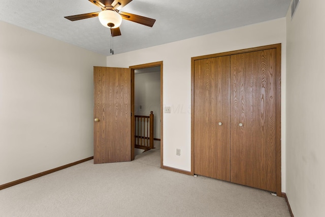 917 Linkfield Dr, Columbus, OH 43085 - unfurnished bedroom with light carpet, baseboards, a closet, and a ceiling fan