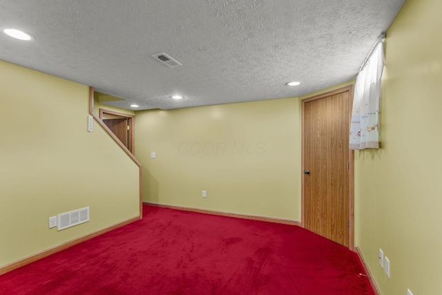 917 Linkfield Dr, Columbus, OH 43085 - finished below grade area featuring a textured ceiling, carpet floors, baseboards, and recessed lighting