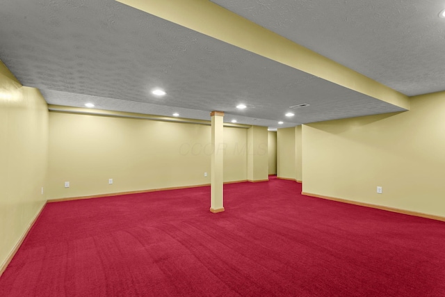 917 Linkfield Dr, Columbus, OH 43085 - finished below grade area featuring a textured ceiling, carpet floors, recessed lighting, and baseboards