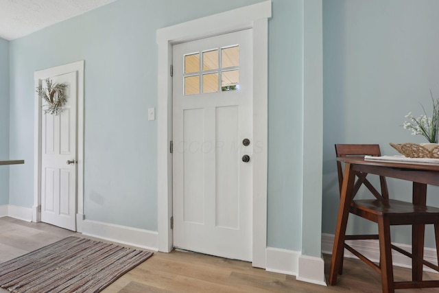 126 S Cherry St, Lancaster, OH 43130 - foyer entrance featuring light wood-type flooring and baseboards