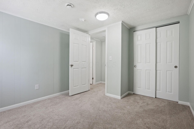 126 S Cherry St, Lancaster, OH 43130 - unfurnished bedroom with carpet, a textured ceiling, a closet, and baseboards