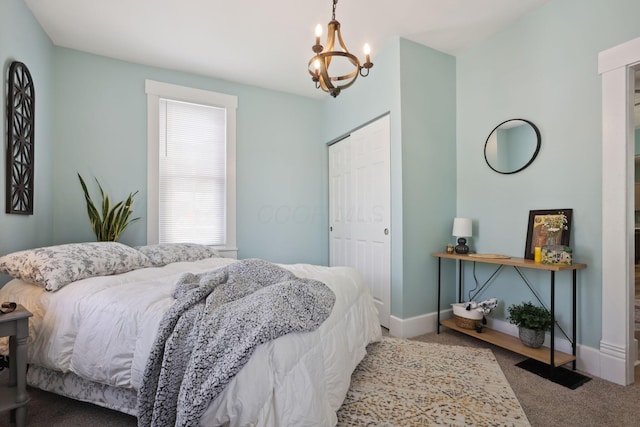 126 S Cherry St, Lancaster, OH 43130 - bedroom featuring carpet floors, a closet, a chandelier, and baseboards