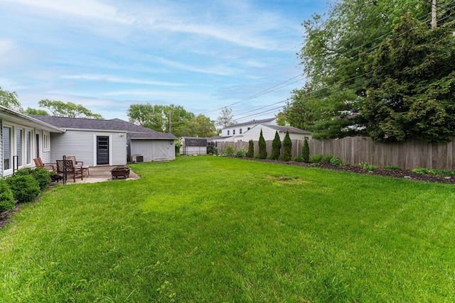 205 Meadowlark Ln, Columbus, OH 43214 - view of yard with a patio and a fire pit
