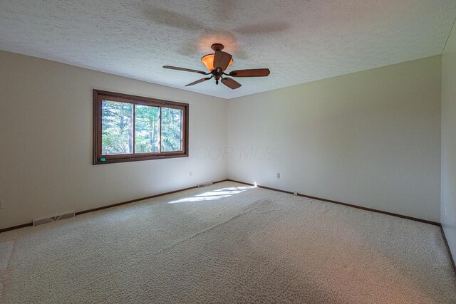 735 Cherrington Rd, Westerville, OH 43081 - spare room featuring carpet flooring, a ceiling fan, baseboards, and a textured ceiling