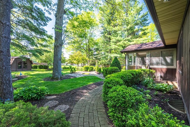 735 Cherrington Rd, Westerville, OH 43081 - view of grassy yard with a sunroom
