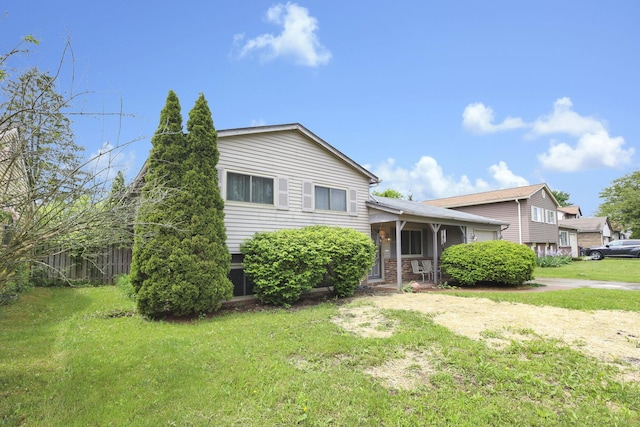 1703 Ringfield Dr, Galloway, OH 43119 - view of front of house featuring a garage, a front yard, and driveway