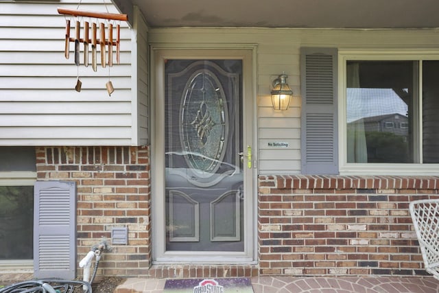 1703 Ringfield Dr, Galloway, OH 43119 - property entrance featuring brick siding