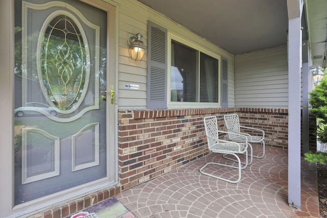 1703 Ringfield Dr, Galloway, OH 43119 - entrance to property with a porch and brick siding