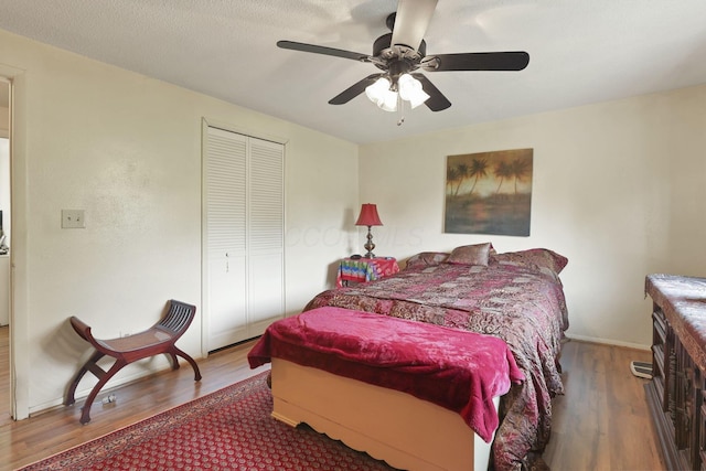 1703 Ringfield Dr, Galloway, OH 43119 - bedroom with wood finished floors, ceiling fan, a closet, and baseboards