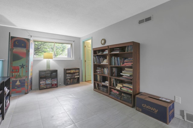 1703 Ringfield Dr, Galloway, OH 43119 - sitting room featuring a textured ceiling