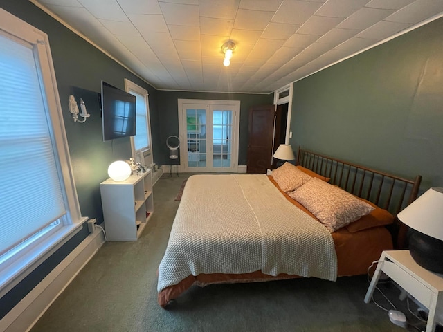 91 Oakland Park Ave, Columbus, OH 43214 - bedroom with carpet floors and ornamental molding