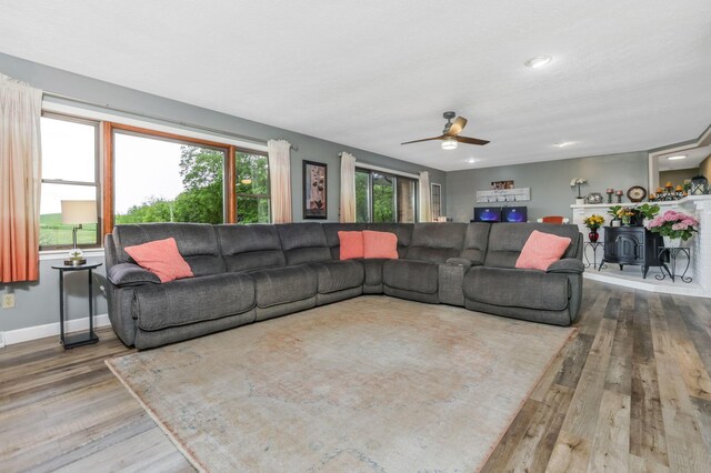 8485 Benson Rd NW, Carroll, OH 43112 - living room featuring wood finished floors, a ceiling fan, baseboards, and recessed lighting