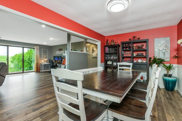 8485 Benson Rd NW, Carroll, OH 43112 - dining space featuring wood finished floors, a desk, a textured ceiling, and recessed lighting
