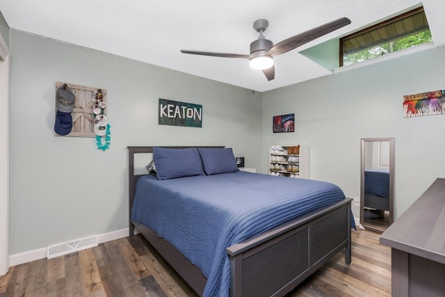 8485 Benson Rd NW, Carroll, OH 43112 - bedroom featuring wood finished floors, a ceiling fan, and baseboards