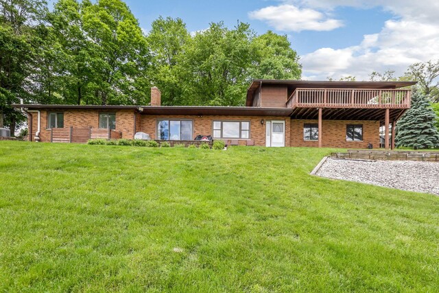 8485 Benson Rd NW, Carroll, OH 43112 - rear view of property featuring brick siding, a lawn, and a chimney