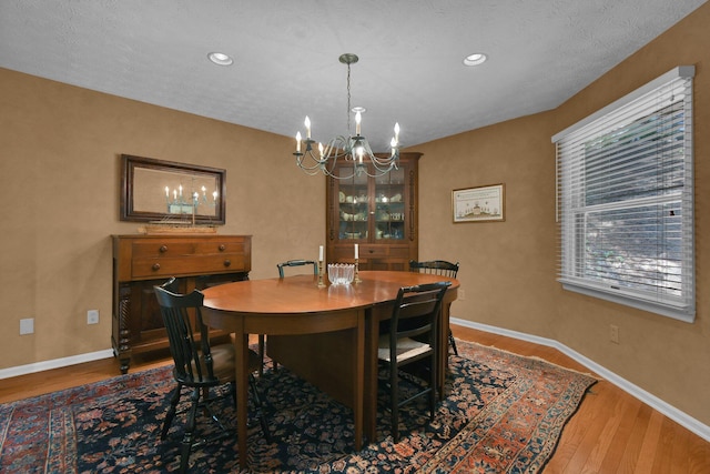 71 Donald Ross Dr, Granville, OH 43023 - dining area featuring a chandelier, wood finished floors, and recessed lighting