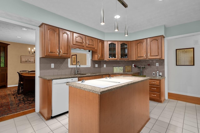 71 Donald Ross Dr, Granville, OH 43023 - kitchen with white appliances, tasteful backsplash, glass insert cabinets, light tile patterned flooring, and recessed lighting