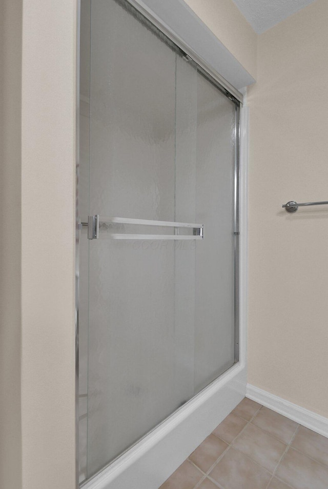 71 Donald Ross Dr, Granville, OH 43023 - bathroom with a stall shower and tile patterned flooring