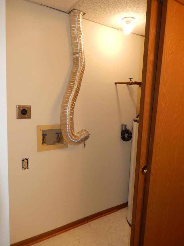 4143 Karl Rd Unit 214, Columbus, OH 43224 - laundry room with hookup for an electric dryer, washer hookup, water heater, and baseboards