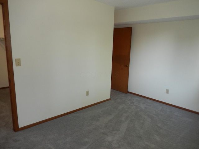 4143 Karl Rd Unit 214, Columbus, OH 43224 - carpeted empty room featuring baseboards