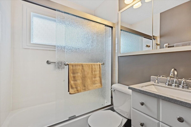1200 Northridge Rd, Columbus, OH 43224 - bathroom with enclosed tub / shower combo, vanity, and toilet
