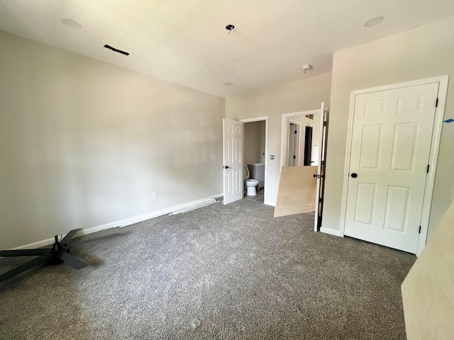 818 Bellows Ave, Columbus, OH 43223 - unfurnished bedroom with dark carpet and baseboards