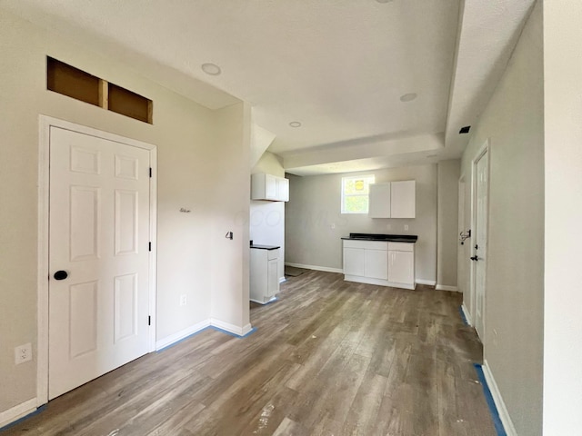818 Bellows Ave, Columbus, OH 43223 - unfurnished living room with wood finished floors and baseboards