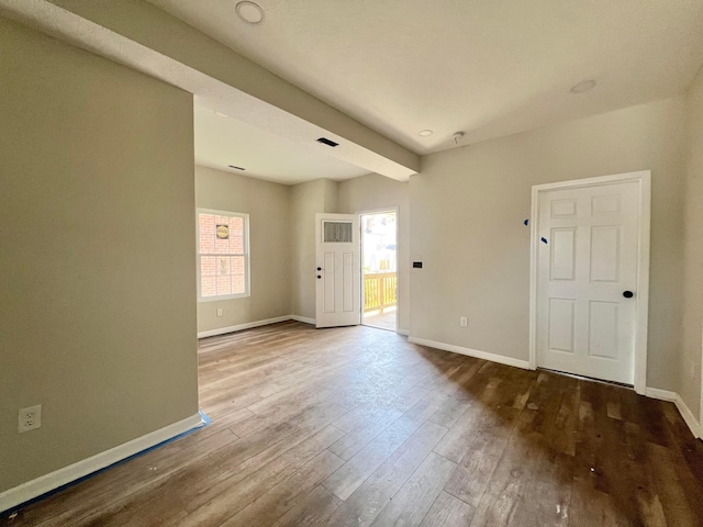 818 Bellows Ave, Columbus, OH 43223 - spare room featuring baseboards and hardwood / wood-style floors