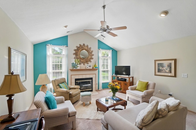 2675 Pine Marsh Dr, Grove City, OH 43123 - living area with carpet floors, ceiling fan, lofted ceiling, and a tile fireplace
