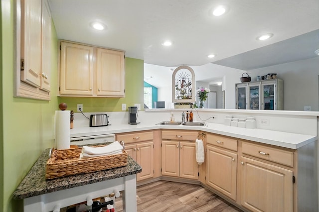 2675 Pine Marsh Dr, Grove City, OH 43123 - kitchen with light brown cabinetry, a sink, a peninsula, light wood-style floors, and recessed lighting