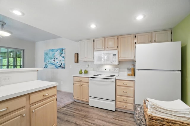 2675 Pine Marsh Dr, Grove City, OH 43123 - kitchen featuring white appliances, light brown cabinetry, light wood finished floors, light countertops, and recessed lighting