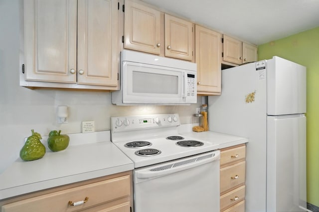2675 Pine Marsh Dr, Grove City, OH 43123 - kitchen with white appliances, light brown cabinets, and light countertops
