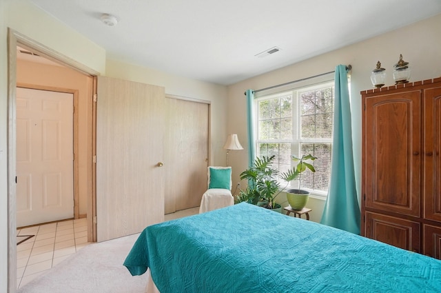 2675 Pine Marsh Dr, Grove City, OH 43123 - bedroom featuring a closet and light tile patterned floors