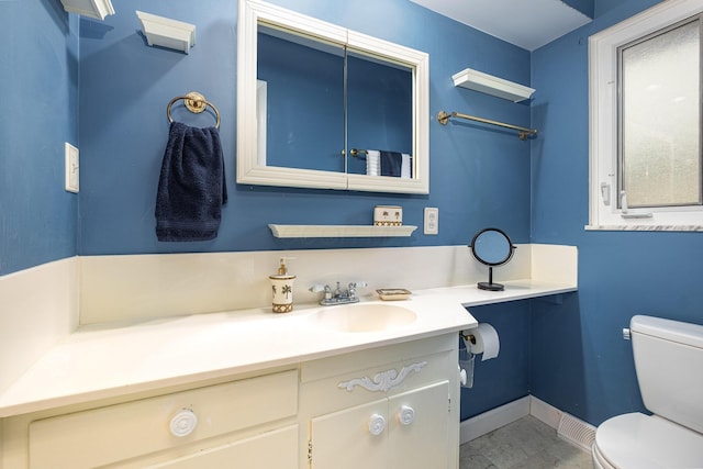 3145 Bembridge Rd, Columbus, OH 43221 - half bath with toilet, vanity, and baseboards
