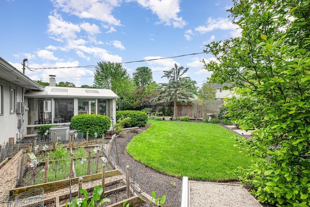 3145 Bembridge Rd, Columbus, OH 43221 - view of yard featuring a garden and a sunroom