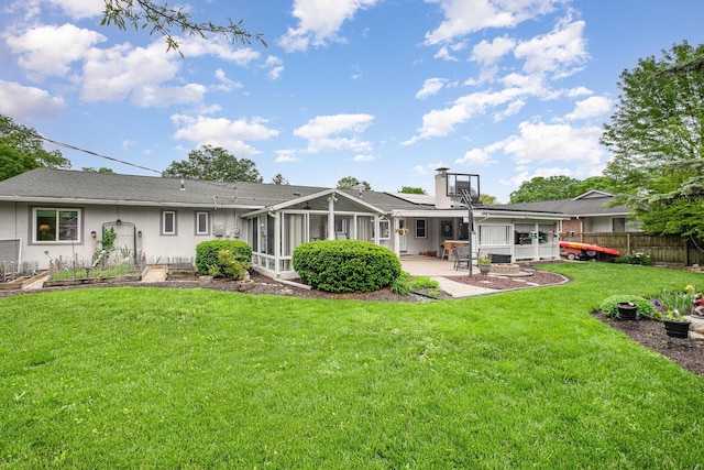 3145 Bembridge Rd, Columbus, OH 43221 - back of property featuring a sunroom, a patio, and a chimney