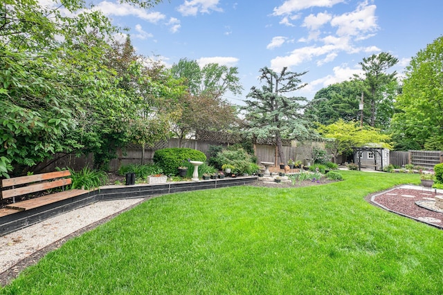 3145 Bembridge Rd, Columbus, OH 43221 - view of yard with a storage shed and an outbuilding