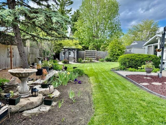 3145 Bembridge Rd, Columbus, OH 43221 - view of yard featuring a storage shed and an outbuilding