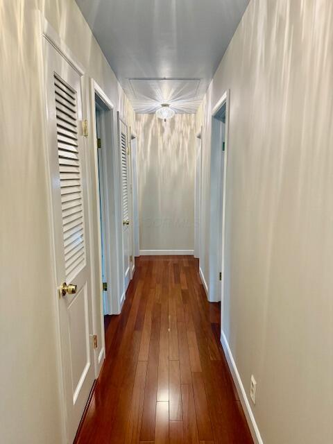 3145 Bembridge Rd, Columbus, OH 43221 - corridor with dark wood finished floors and baseboards