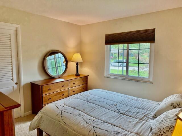 3145 Bembridge Rd, Columbus, OH 43221 - bedroom featuring light colored carpet and baseboards