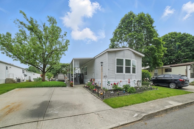 25 Ravine Ridge Dr, Delaware, OH 43015 - manufactured / mobile home featuring a front lawn