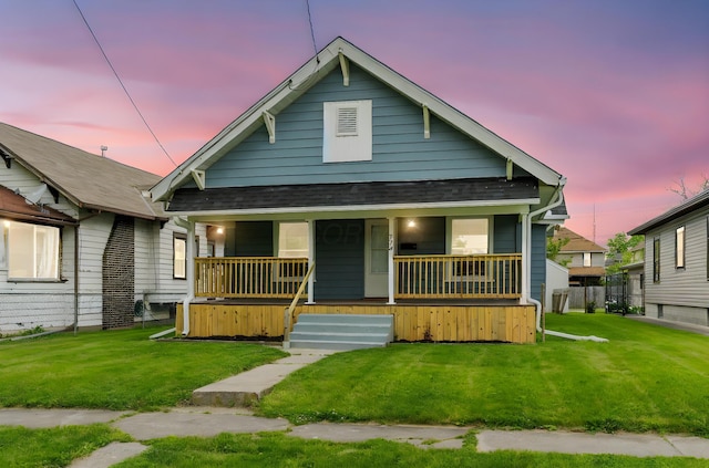 774 Congress St, Marion, OH 43302 - view of front of property with a porch, roof with shingles, and a front lawn