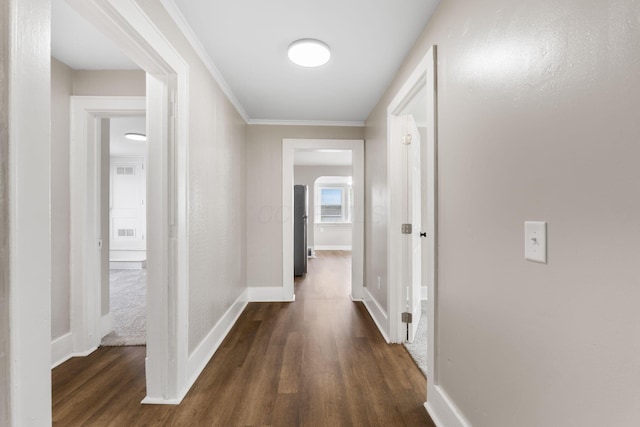774 Congress St, Marion, OH 43302 - corridor with dark wood-type flooring, baseboards, and crown molding
