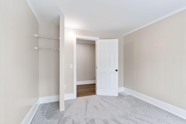 774 Congress St, Marion, OH 43302 - unfurnished bedroom with carpet flooring, a closet, crown molding, and baseboards