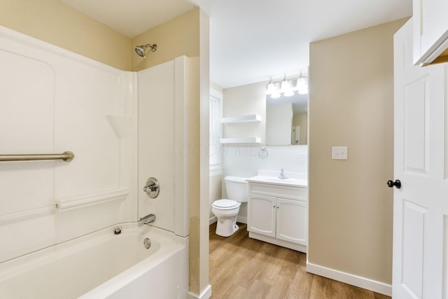 774 Congress St, Marion, OH 43302 - full bath featuring vanity, washtub / shower combination, wood finished floors, baseboards, and toilet